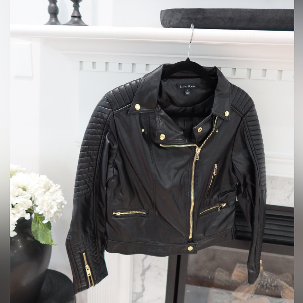 Love Tree, Black leather jacket with gold accents